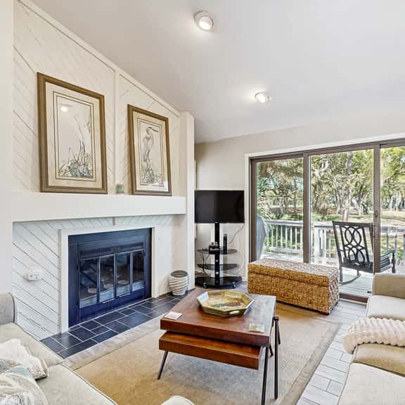 Golf course home with deck, porch & lagoon view - 1 block to beach, 1 dog OK - Image 1