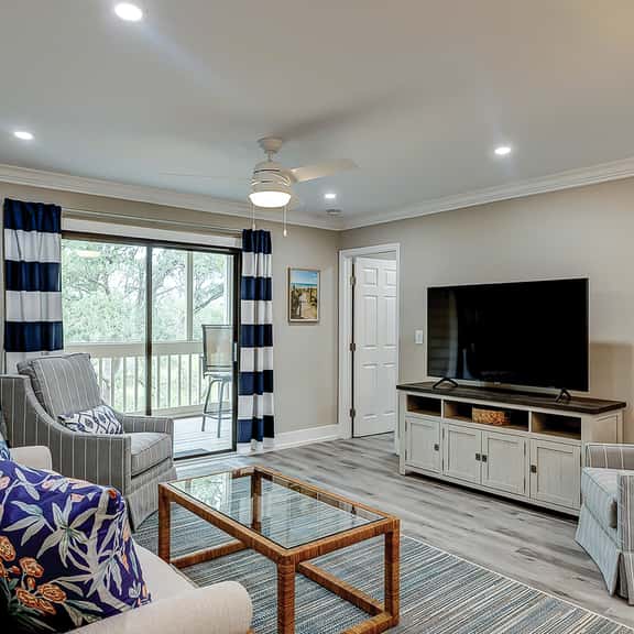 Fully updated condo with serene view, enclosed balcony, WiFi, W/D, pool, & gym - Image 1