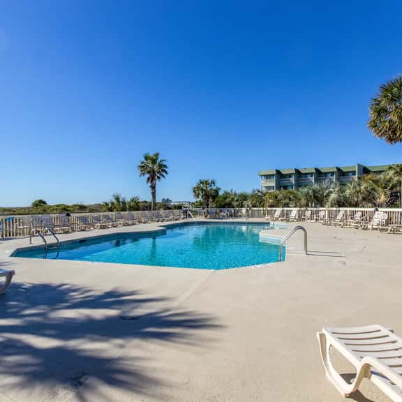 Oceanfront condo with water views, pool, balcony, & easy beach access - Image 1
