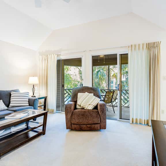 Lagoon view, second floor villa w/ screened in porch, short walk to the beach - Image 1