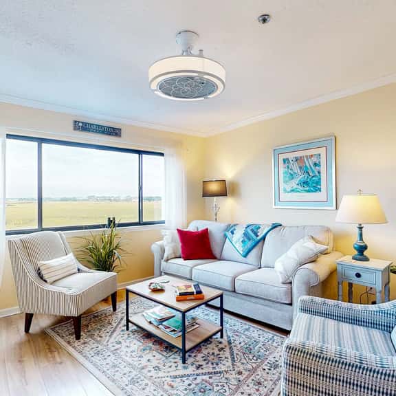 Marsh-view condo with on-site pool, tennis, & private balcony - Image 1