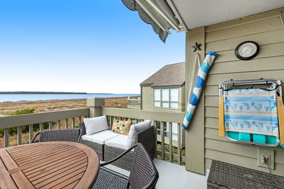 2nd floor villa with water views, lovely balcony & w/d - walk to Beach Club