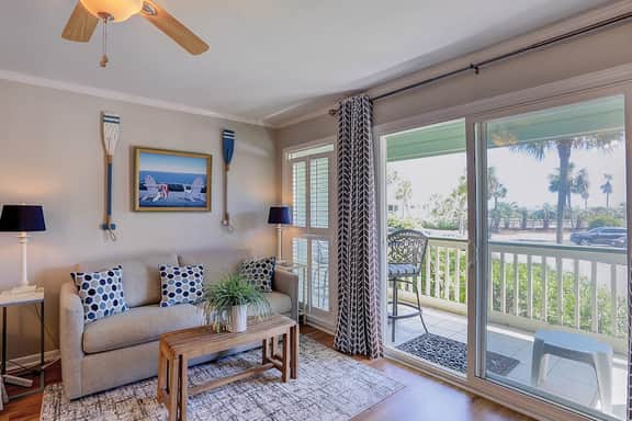 Beachfront condo with pool, beach access, pier, private balcony, & central AC