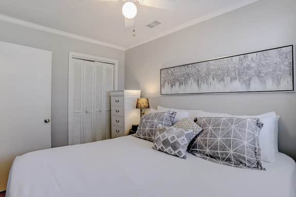 Beachfront condo with pool, beach access, pier, private balcony, & central AC