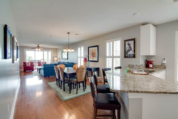 Beachfront villa w/ ocean views, private deck, pool access – steps from beach
