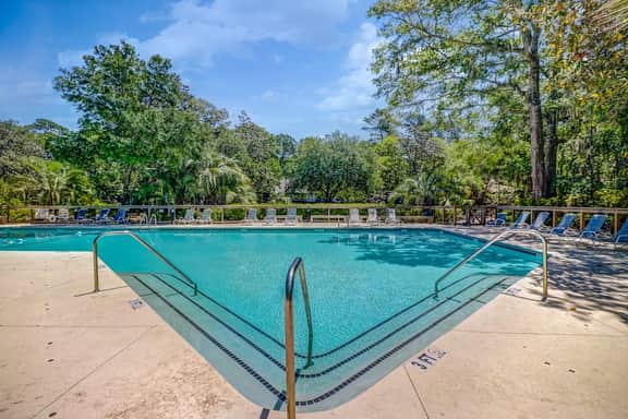 Beautiful Home in the Woods with Updated Amenities and Shared Pool