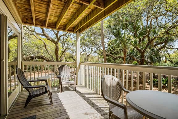 Beautiful villa surrounded by lush landscaping - walk to beach, golf & pool
