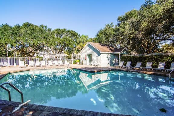 Beautifully decorated cottage steps from the beach with pool & open layout