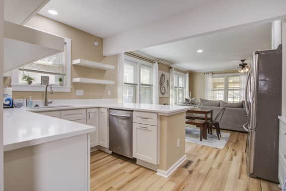 Charming home steps from beach with two full kitchens, deck, patio, WiFi & AC