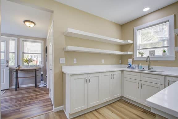 Charming home steps from beach with two full kitchens, deck, patio, WiFi & AC