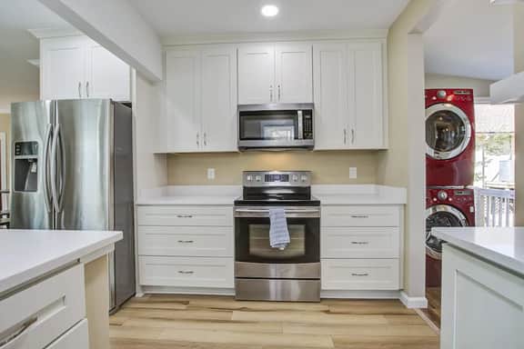 Charming home steps from beach with two full kitchens, deck, patio, WiFi & AC