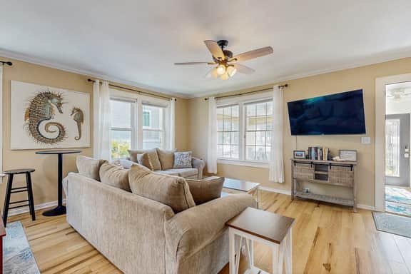 Charming home with enclosed porch, WiFi, & central AC - walk to beach and shops