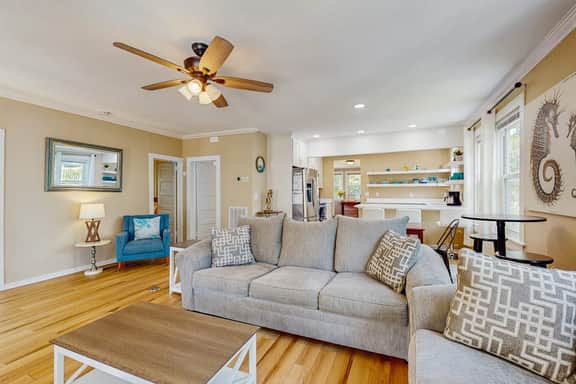 Charming home with enclosed porch, WiFi, & central AC - walk to beach and shops