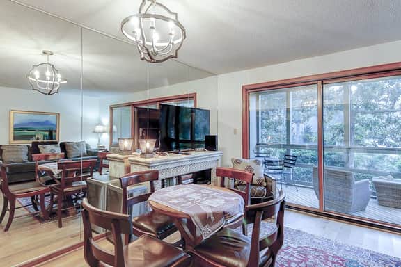 Comfortable ground-floor condo with enclosed patio, washer/dryer, & AC