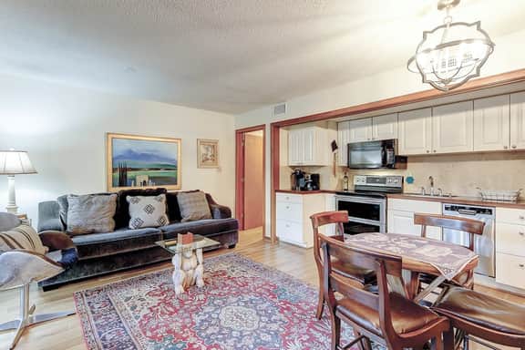 Comfortable ground-floor condo with enclosed patio, washer/dryer, & AC