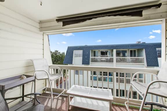 Comfortable villa one row away from the beach w/shared pool & grills
