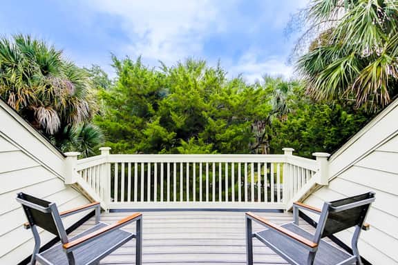 Golf-and-sea villa within walking distance of beach + resort amenities