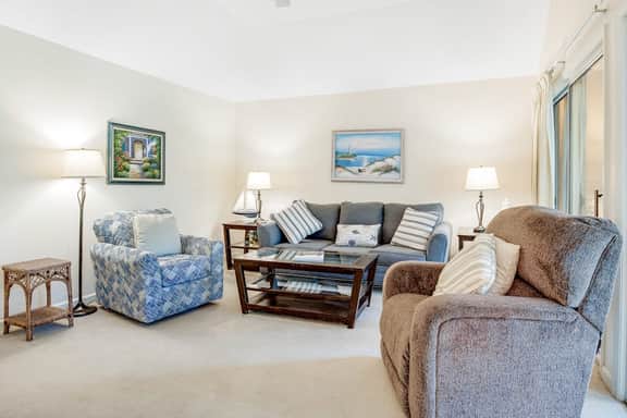 Lagoon view, second floor villa w/ screened in porch, short walk to the beach