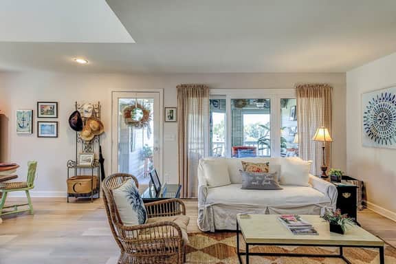 Lovely condo near beach with enclosed porch, pool, tennis, and golf access