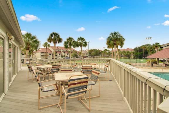 Marsh-view condo with on-site pool, tennis, & private balcony