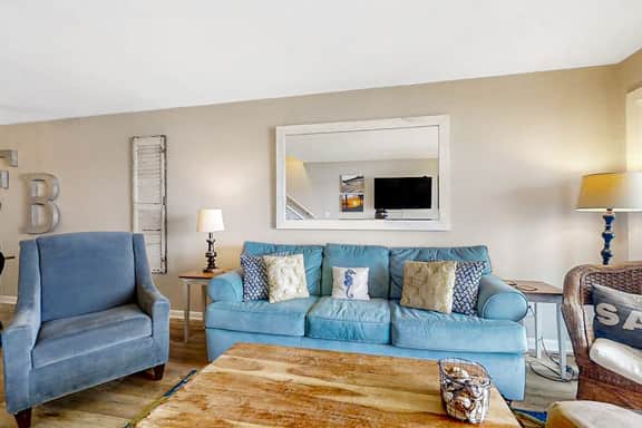 Newly renovated two-story waterfront condo with screened porch, pool, & tennis