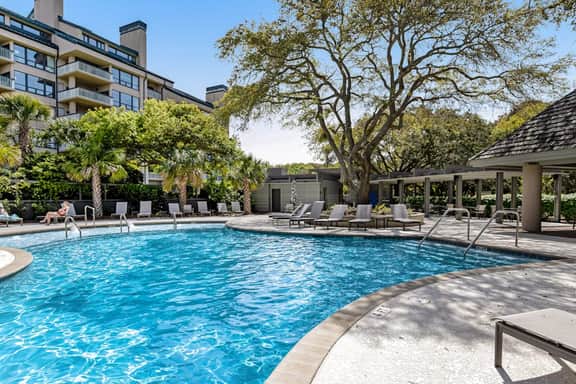 Oceanfront condo on the beach with shared pool, hot tub, & gorgeous decor