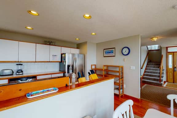 Oceanfront home with stunning ocean views, central AC, and private W/D