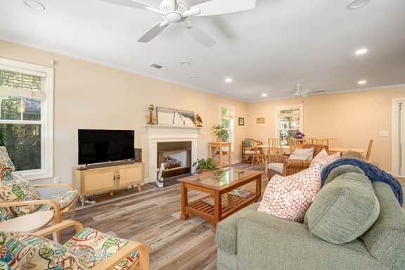 Palmetto-lined home with porches, yard & hammock - walk to beach/town