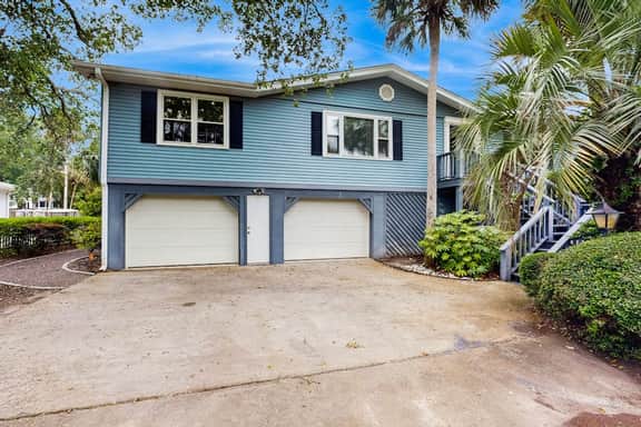 Peaceful Isle of Palms escape with heated pool,  grill and patio