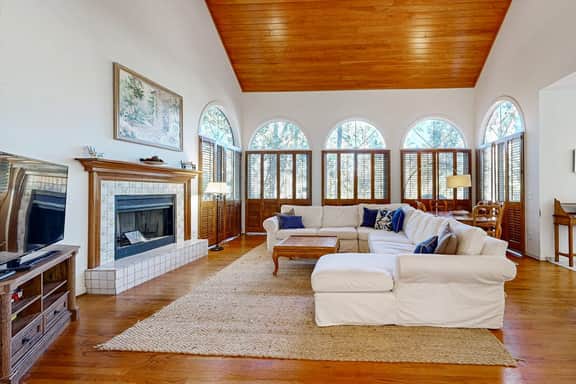 Private home with large deck and views of a lagoon – walk or bike to the beach