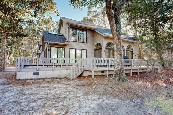 Private home with large deck and views of a lagoon – walk or bike to the beach