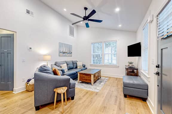 Renovated charmer with chef's kitchen, front porch, work desk, AC, & firepit