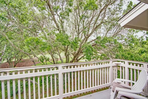 Renovated townhome next to golf course w/ community pool access- close to beach