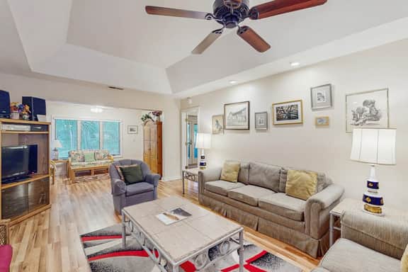 Scenic-view cottage with sunroom, deck, kitchen & pool - close to beach & golf