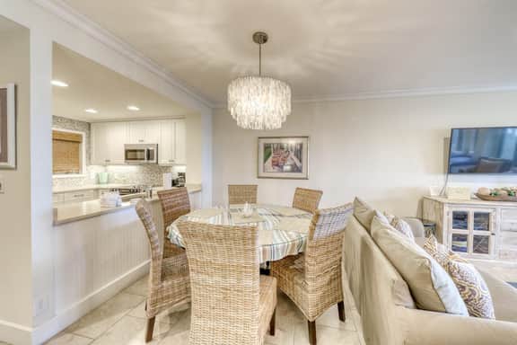 Second Floor villa w/ ocean views from deck - steps from beach for sun and sand