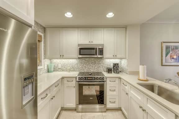 Second Floor villa w/ ocean views from deck - steps from beach for sun and sand