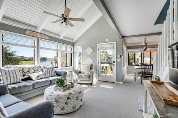 Stylish beach villa with three decks, and golf course views