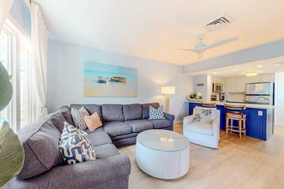 Two-story condo near beach with on-site pool & screened deck