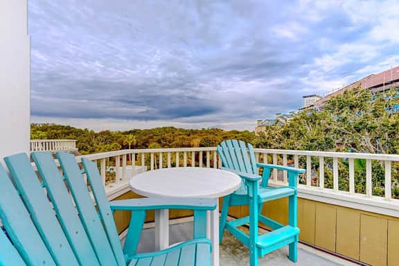 Two-story condo near beach with on-site pool & screened deck