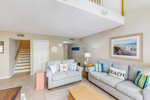 Updated townhome with golf course views, pool, and tennis