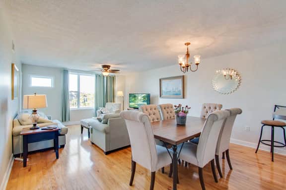 Second-floor condo with river views and access to a community pool - Image 4