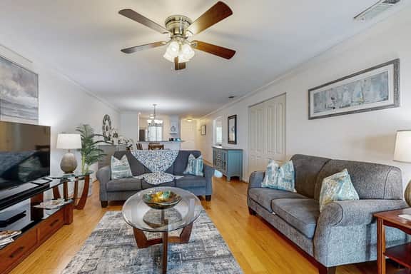 Elegant riverfront condo with access to private W/D, central AC, and pool access - Image 3