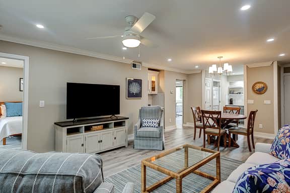 Fully updated condo with serene view, enclosed balcony, WiFi, W/D, pool, & gym - Image 5
