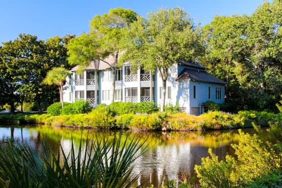 Lagoon view, second floor villa w/ screened in porch, short walk to the beach - Image 3