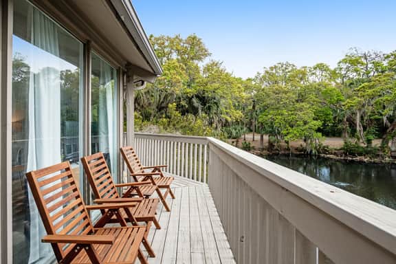 Lakefront home with lagoon view, deck & AC - close to beach, golf, & pools - Image 3