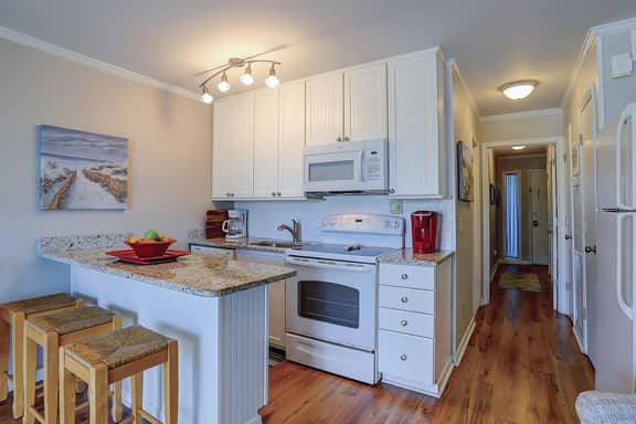Beachfront condo with pool, beach access, pier, private balcony, & central AC - Image 3