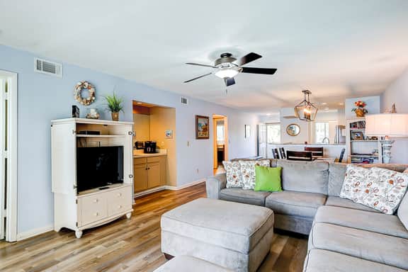 Riverfront condo with pool, 2 tennis courts, & screened porch - near beach - Image 2