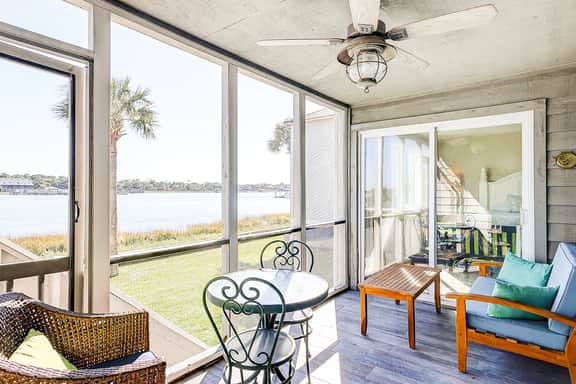Riverfront condo with pool, 2 tennis courts, & screened porch - near beach - Image 3
