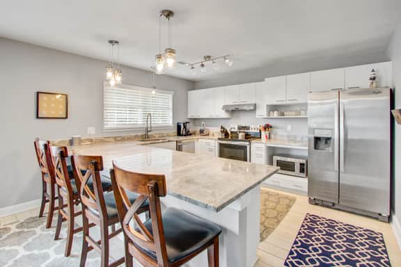 Convenient dog-friendly retreat steps from the beach with grill & screened porch - Image 2
