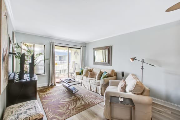 Comfortable villa one row away from the beach w/shared pool & grills